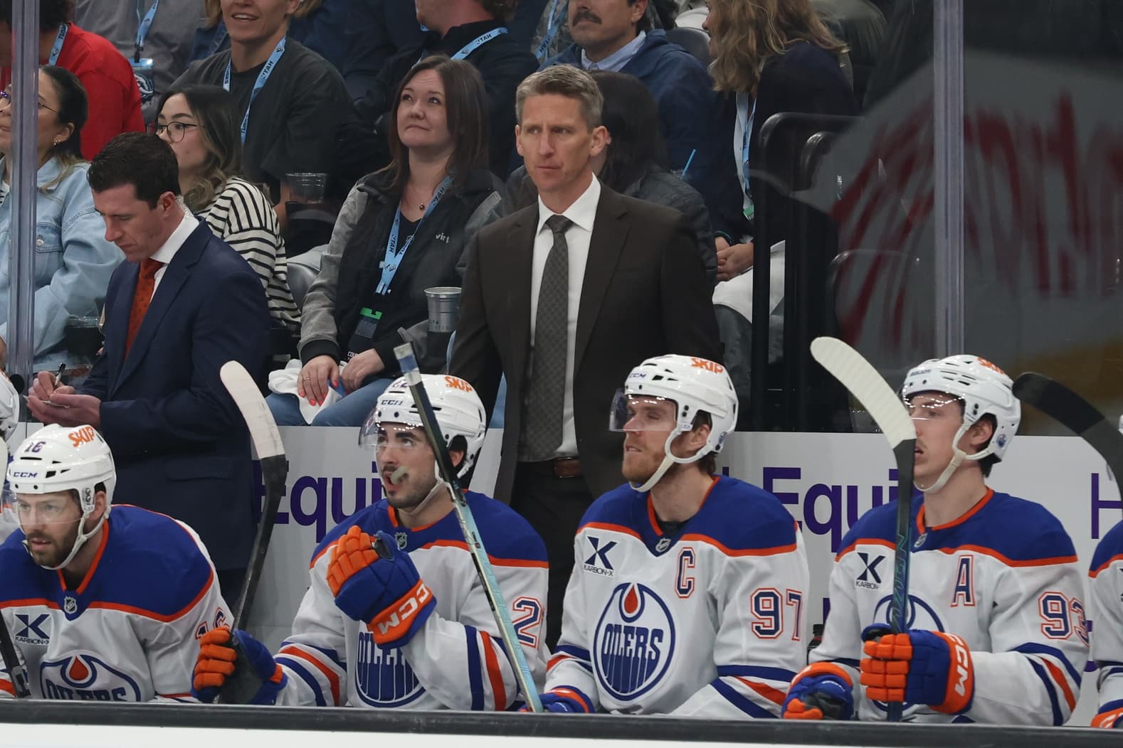 Edmonton Oilers Kris Knoblauch behind the bench