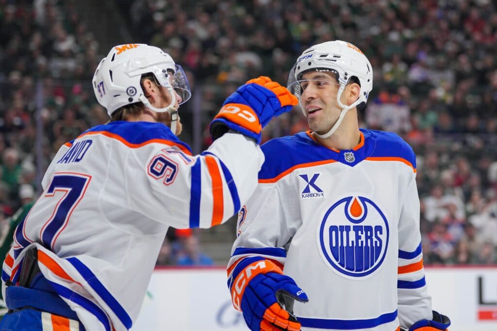 Edmonton Oilers Evan Bouchard and Connor McDavid celebrate goal