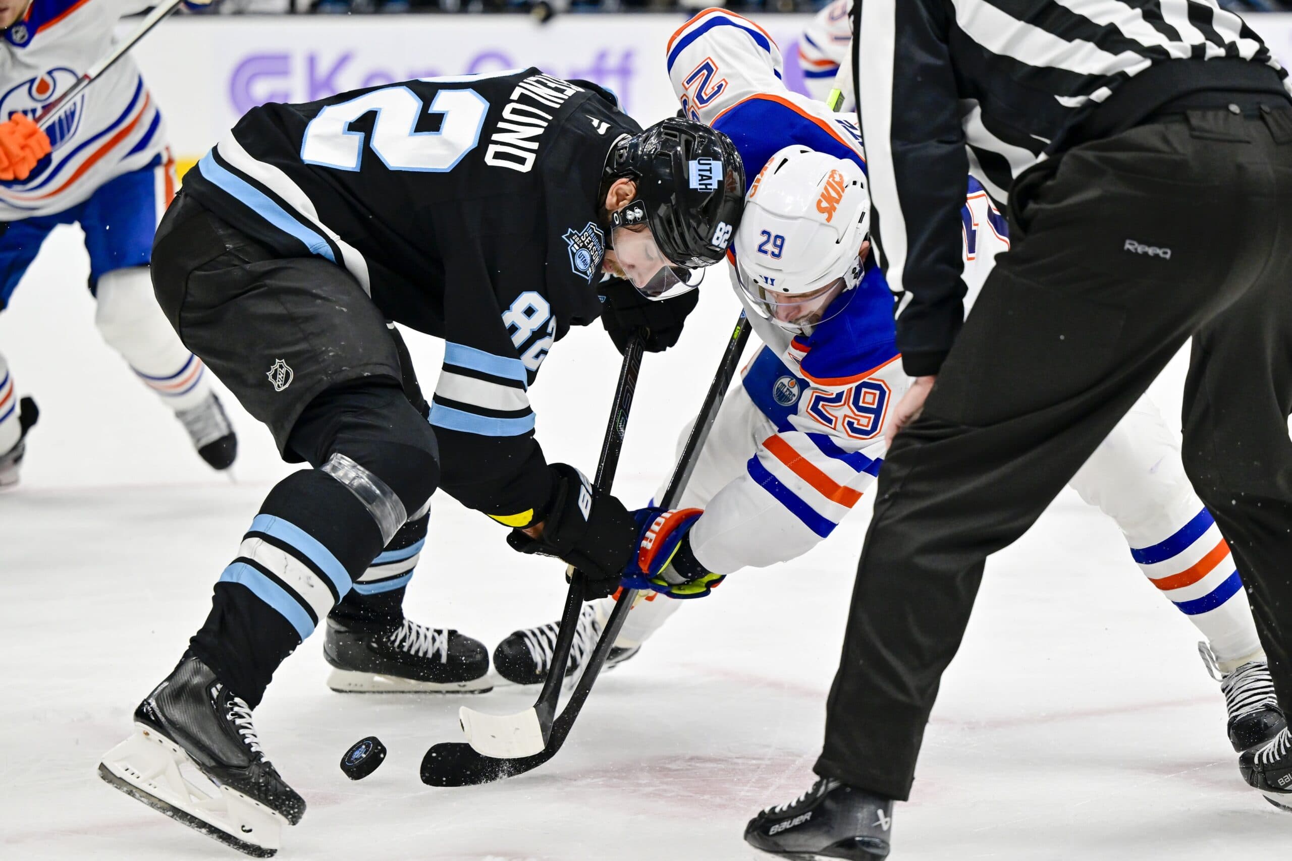 Edmonton Oilers Leon Draisaitl faces off against Utah Hockey Club