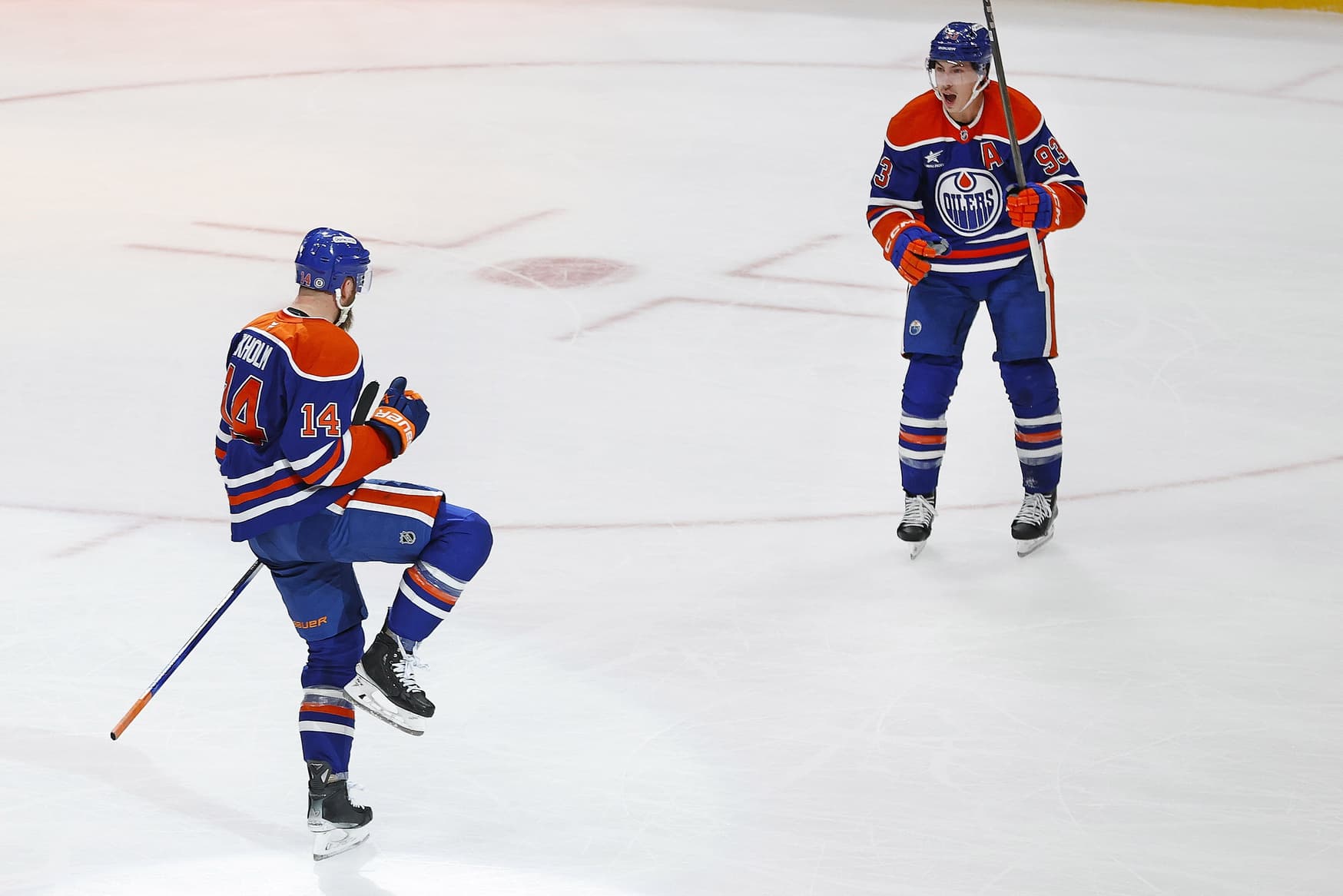 Edmonton Oilers defensemen Mattias Ekholm (14) celebrates his overtime winning goal against the Boston Bruins at Rogers Place