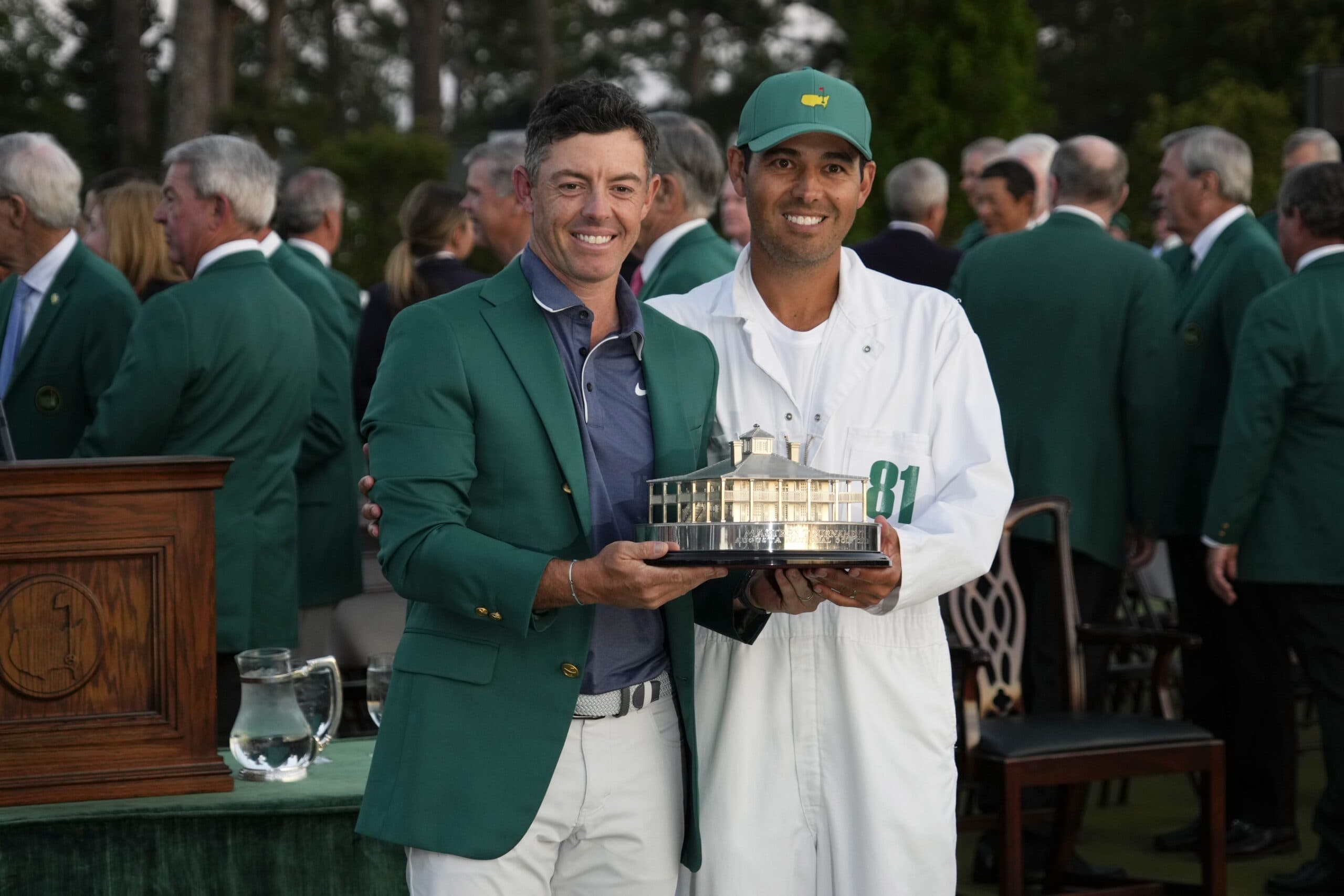Rory McIlroy and his caddie Harry Diamond celebrate with