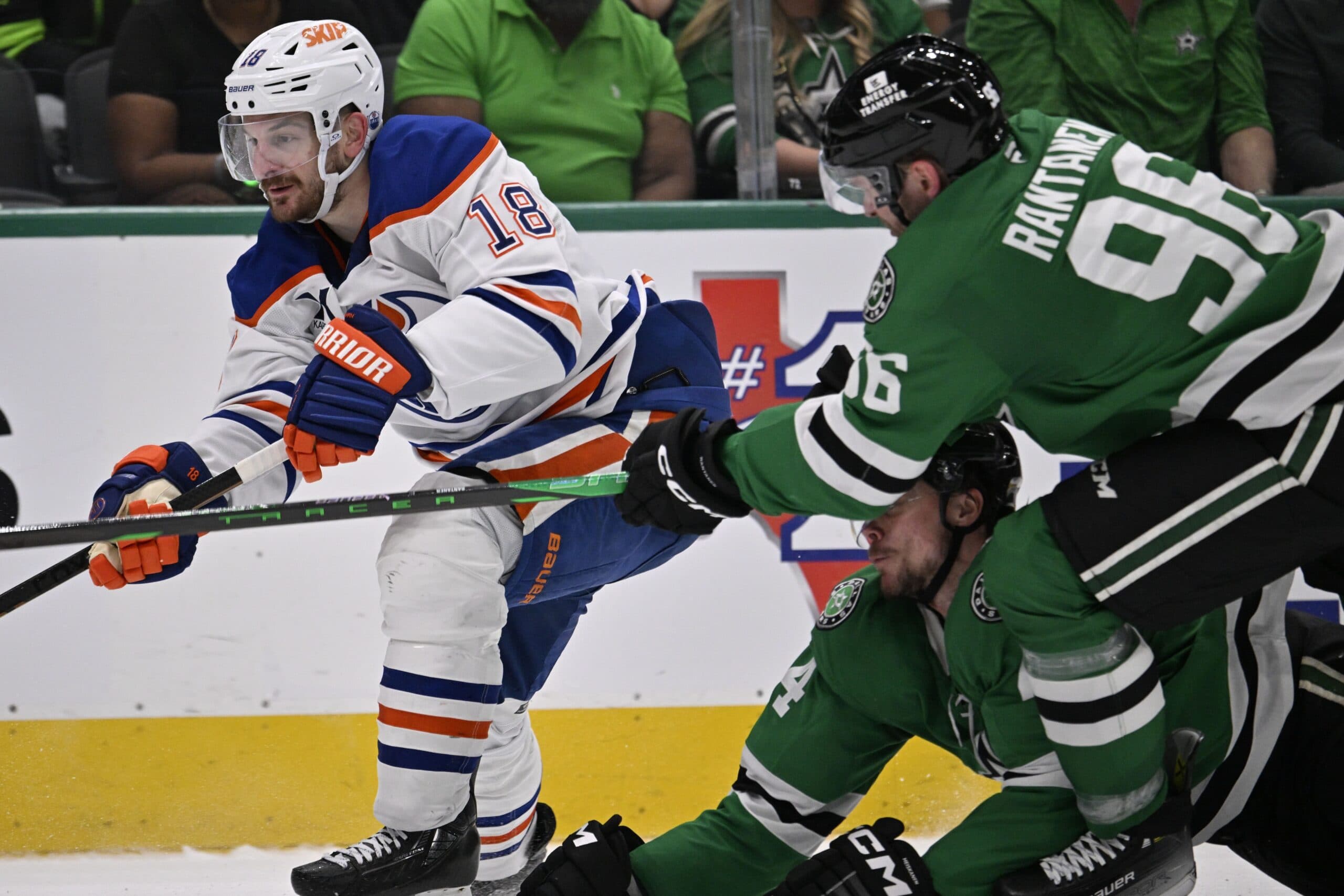 Dallas Stars right wing Mikko Rantanen (96) slashes Edmonton Oilers left wing Zach Hyman (18) in the third period for game two of the Western Conference Final of the 2025 Stanley Cup Playoffs at American Airlines Center.