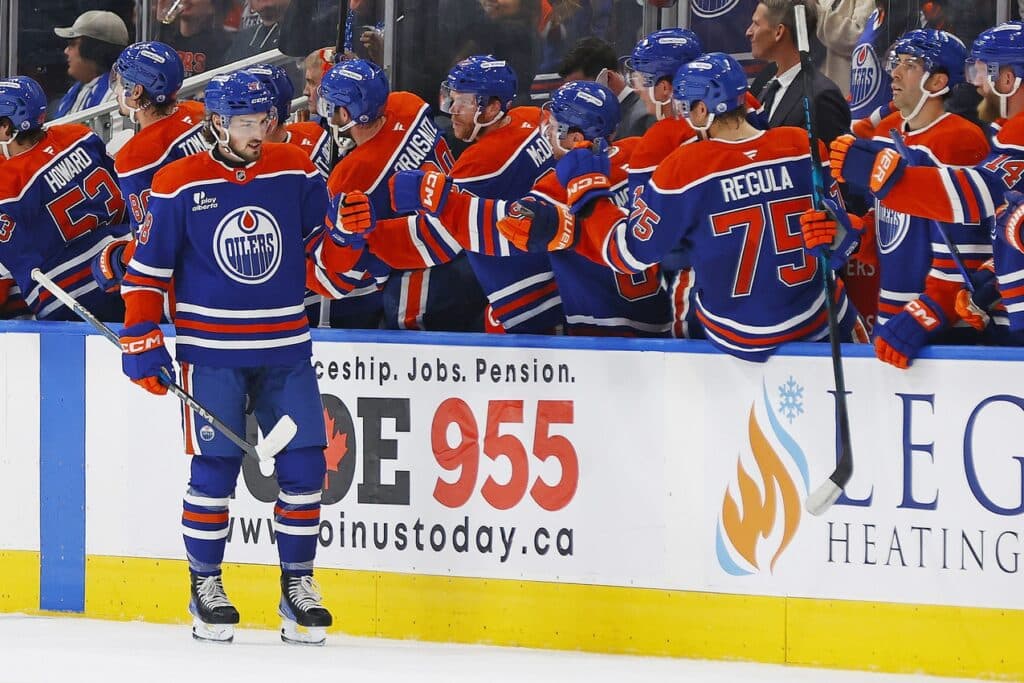 The Edmonton Oilers celebrate a goal scored by forward Noah Philp (48), his first goal in the NHL, during the second period against the Vancouver Canucks at Rogers Place.