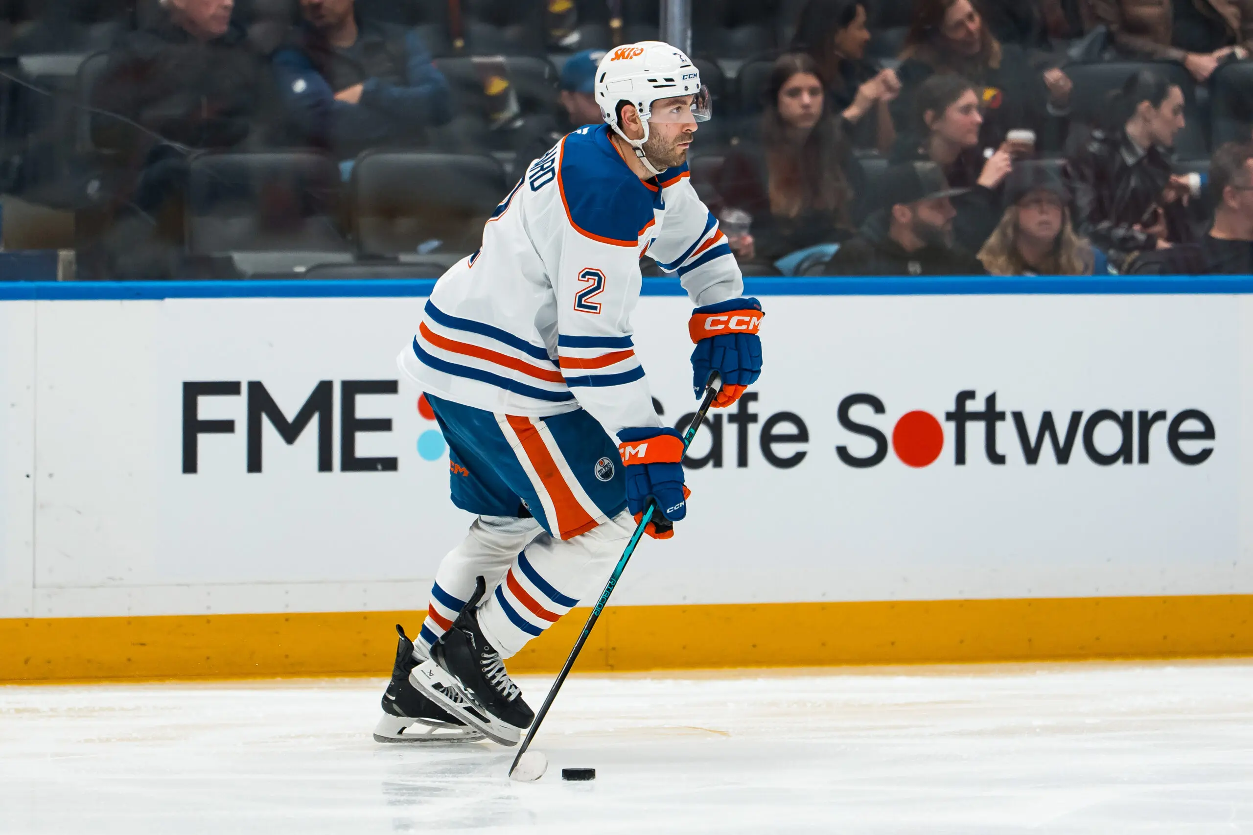 Jan 17, 2026; Vancouver, British Columbia, CAN; Edmonton Oilers defenseman Evan Bouchard (2) handles the puck against the Vancouver Canucks in the second period at Rogers Arena. Mandatory Credit: Bob Frid-Imagn Images