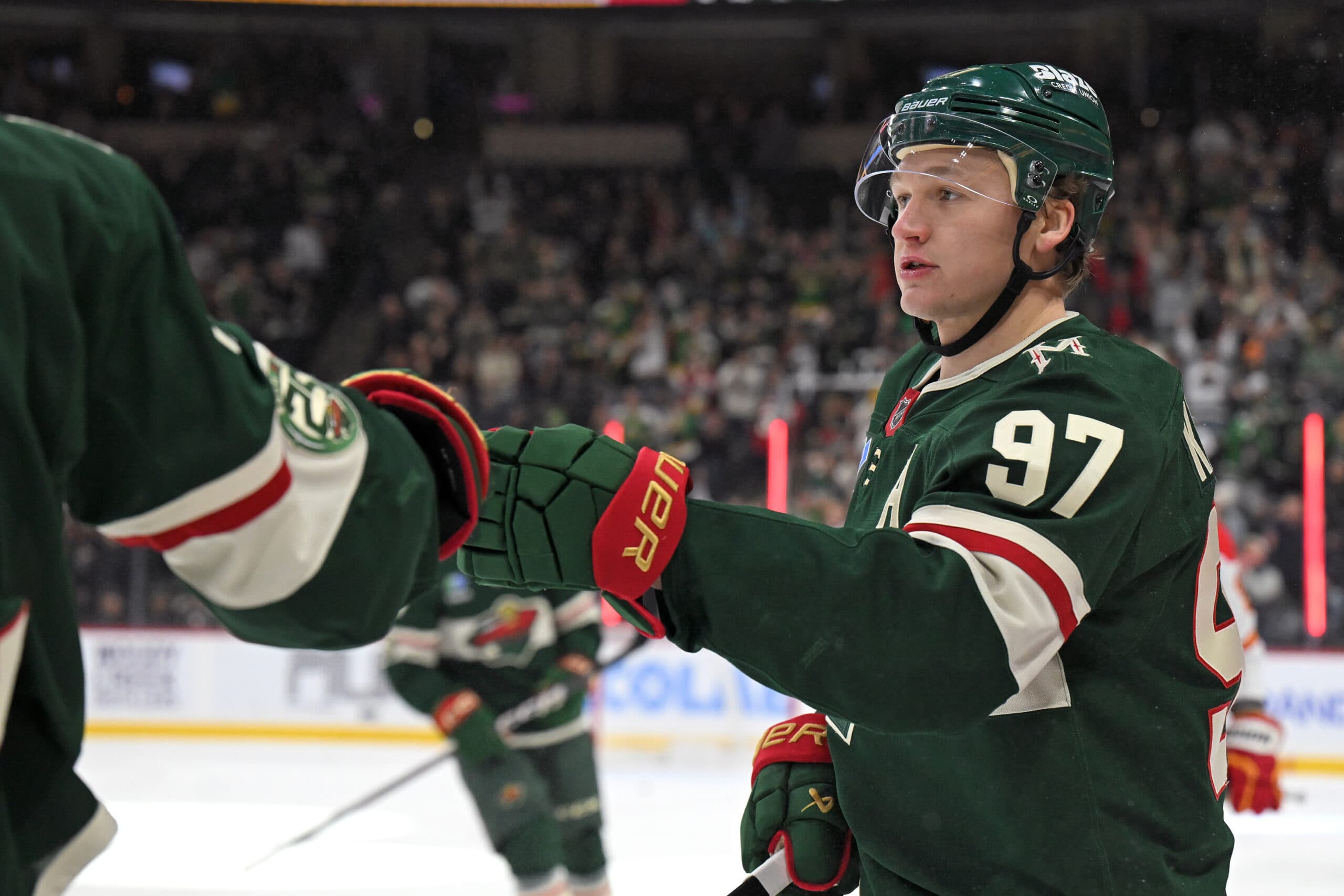 Jan 29, 2026; Saint Paul, Minnesota, USA; Minnesota Wild forward Kirill Kaprizov (97) celebrates his empty net goal against the Calgary Flames during the third period at Grand Casino Arena. Mandatory Credit: Nick Wosika-Imagn Images